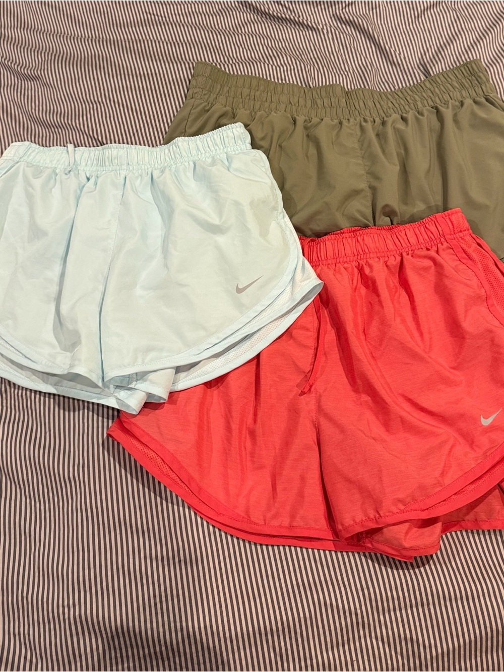 Nike Women's Light Blue, Olive, and Coral Athletic Running Shorts Trio